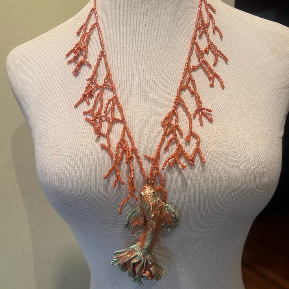 Handmade seed bead necklace with polymer clay koi.